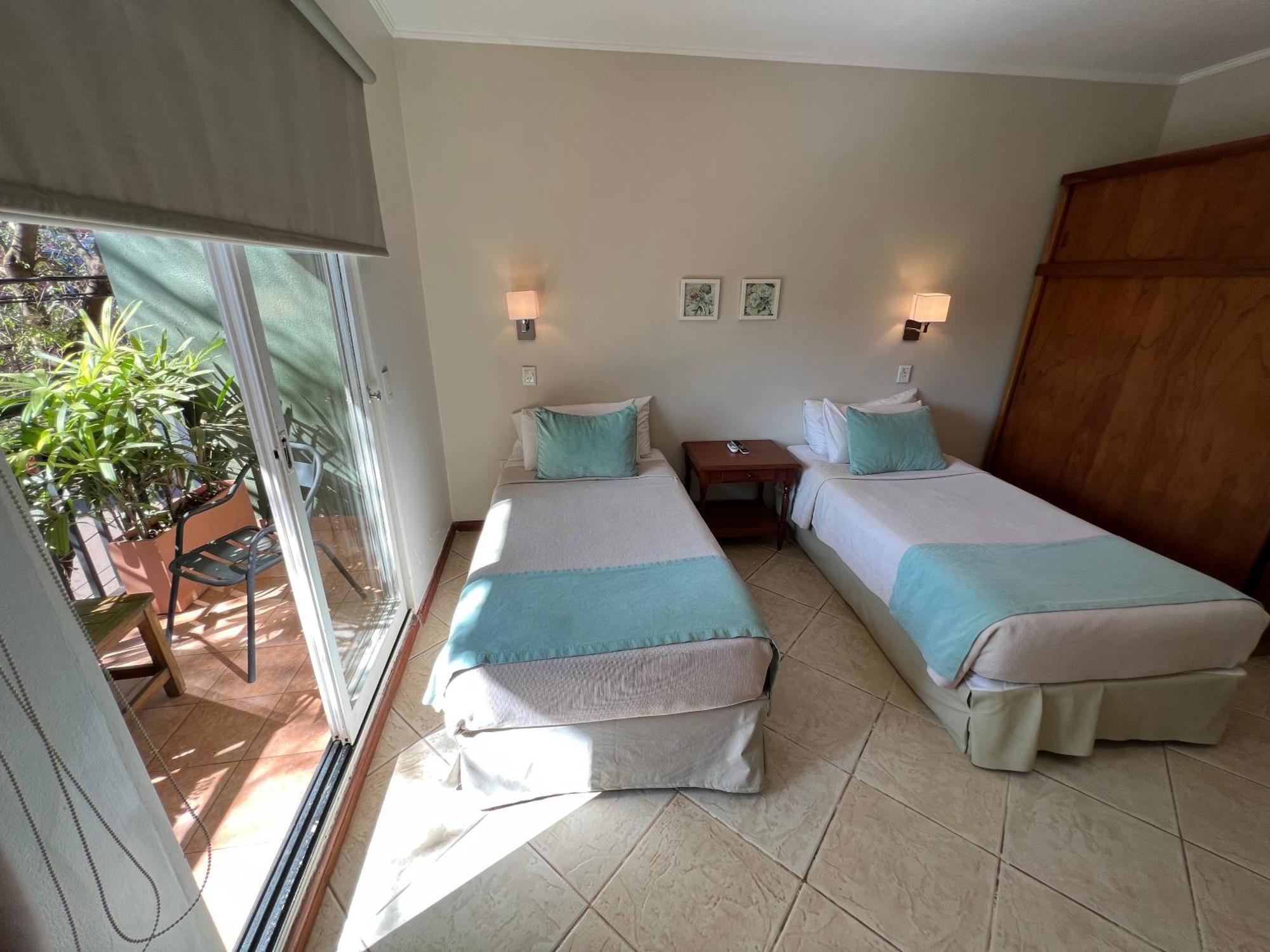 Flora Apartments Puerto Iguazú Buitenkant foto